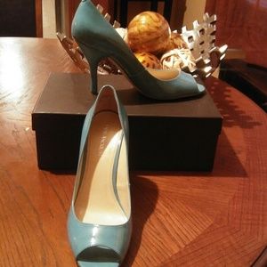 Enzo Angiolini peep toe pumps.